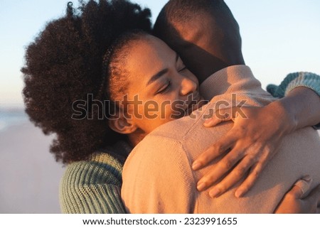 Similar – Image, Stock Photo Romantic black couple embracing on street