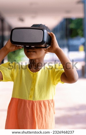 Similar – Image, Stock Photo Child in VR headset playing on couch