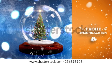 Snow falling against christmas tree in snow globe
