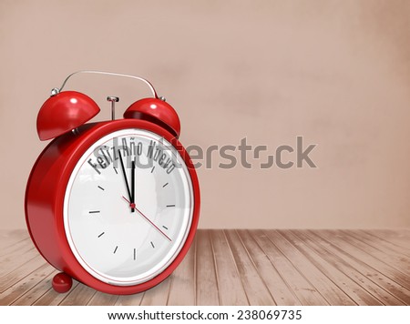 Feliz ano nuevo in red alarm clock against room with wooden floor