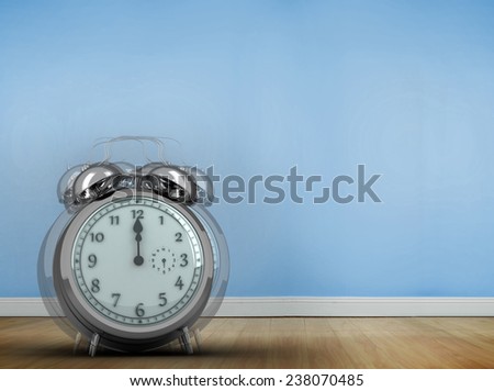 Alarm clock counting down to twelve against blue room with wooden floor