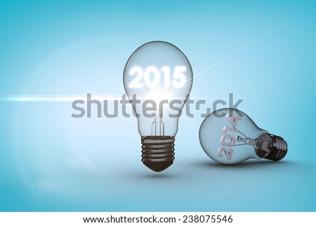 2014 and 2015 in light bulb against blue vignette