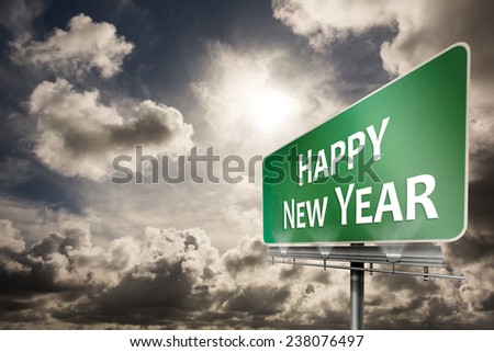 Happy new year against dark sky with white clouds