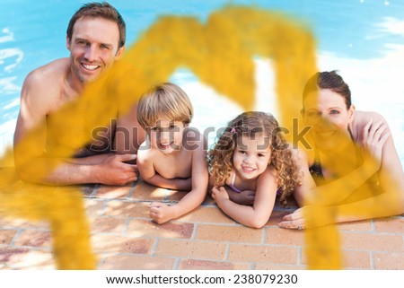 Happy family beside the swimming pool against house outline in clouds
