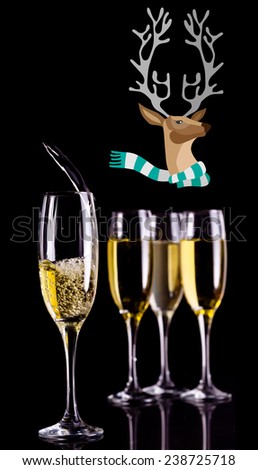 hipster reindeer against full glasses of champagne and one being filled