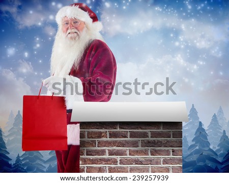 Santa carries red gift bag against snow falling on fir tree forest