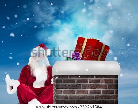 Santa Claus sits and meditates against blue sky