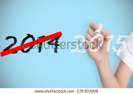 Female hand holding whiteboard marker against blue background with vignette