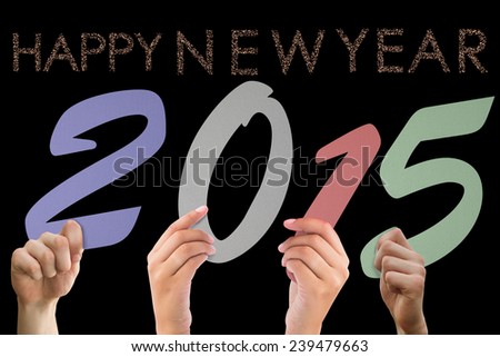 Hands holding poster against glittering happy new year