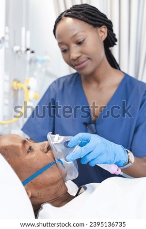 Similar – Image, Stock Photo Doctor applying a medicine during inhalation to senior man suffering from lung disease. Covid-19 or coronavirus treatment
