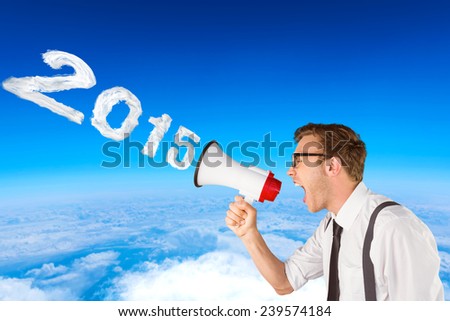 Geeky businessman shouting through megaphone against blue sky over white clouds