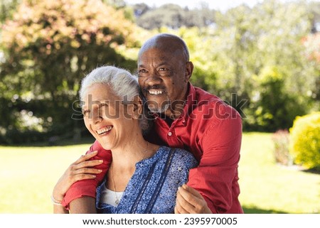 Similar – Image, Stock Photo Multiracial couple in the park