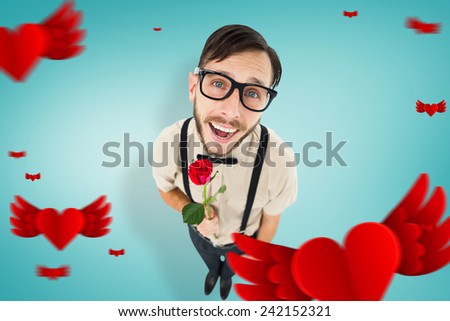 Geeky lovesick hipster holding rose against blue vignette background