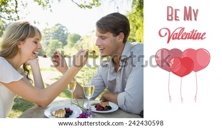 Cute couple feeding each other dessert against cute valentines message
