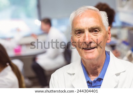 Science lecturer smiling at camera at the university
