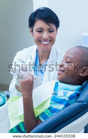Side view of smiling boy waiting for a dental exam