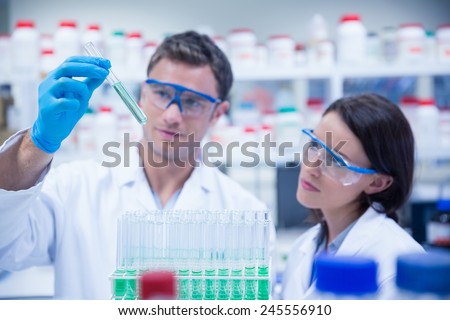 Similar – Image, Stock Photo caucasian doctor holding test tube with blood for 2019-nCoV analyzing. Chinese Corona virus blood test concept