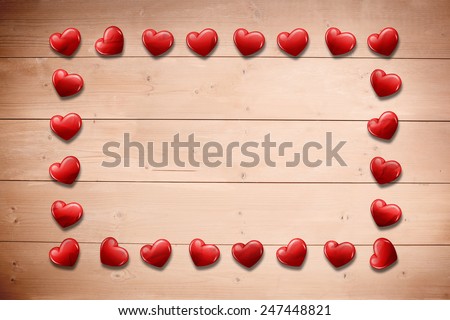 Heart frame against overhead of wooden planks