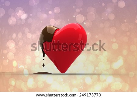 Heart dipped in chocolate against pink abstract light spot design