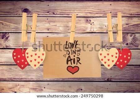 love is in the air against wooden planks background
