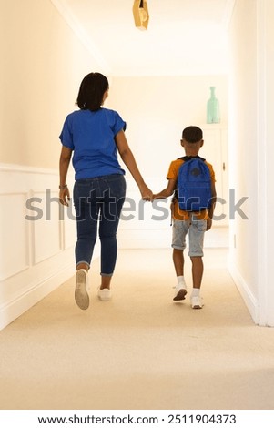 Similar – Image, Stock Photo Mother holding walking child