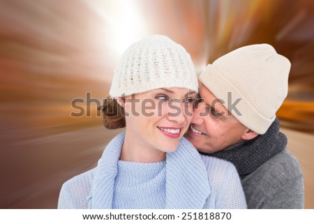 Casual couple in warm clothing against blurry new york street