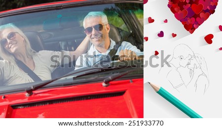 Happy mature couple in red cabriolet against sketch of kissing couple with pencil