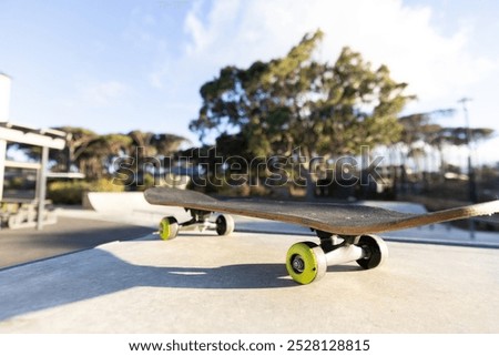 Similar – Image, Stock Photo Skateboarder resting on the ramp