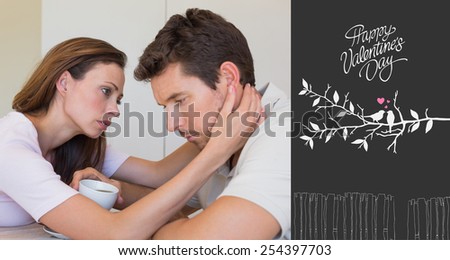 woman consoling a sad man at home against cute valentines message