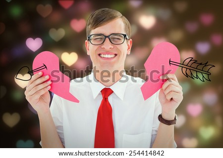 Broken hearted geek against valentines heart design