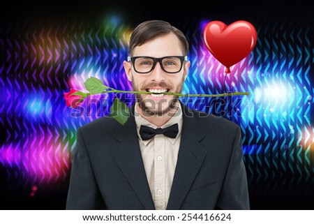 Geeky hipster holding rose between teeth against digitally generated cool disco design