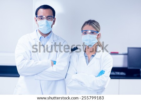Science students wearing protective masks at the university