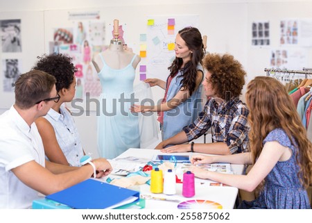 Attractive fashion designers in meeting