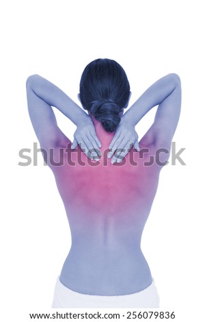 Rear view of a topless young woman suffering from neck ache over white background