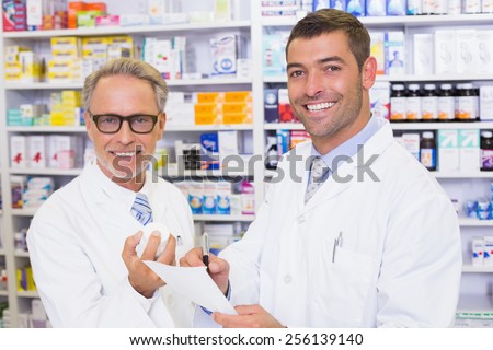 Pharmacist looking a medication for a prescription in the pharmacy