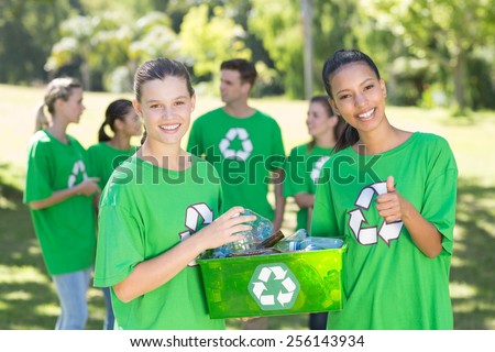 Happy environmental activists in the park on a sunny day