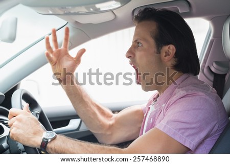 Man having road rage in his car
