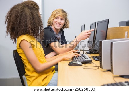 Students working on computer in classroom at the university