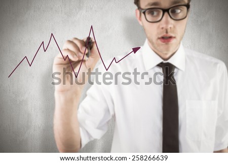 Geeky businessman writing with marker against white background