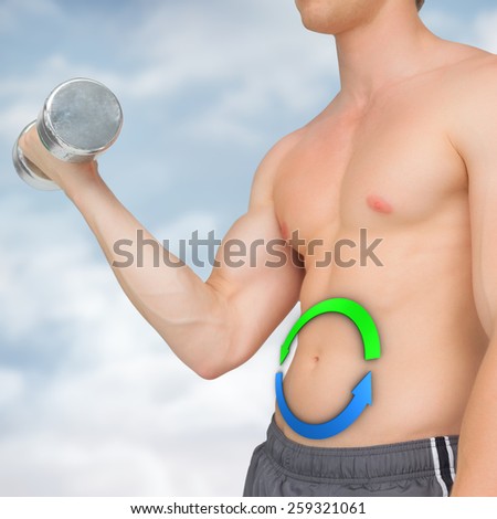Strong man lifting dumbbell with no shirt on against mountain peak through the clouds
