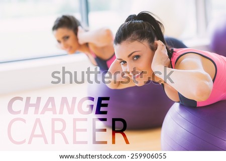 Portrait of two fit women exercising on fitness balls against change career