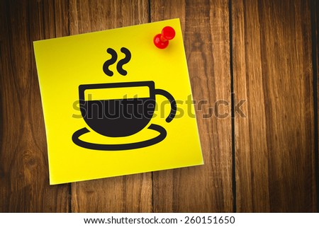 Coffee cup graphic against yellow pinned adhesive note
