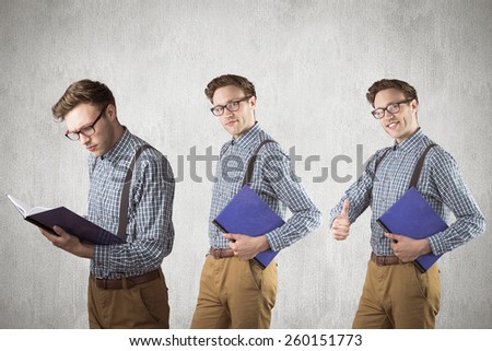 Nerd with notebook against white and grey background