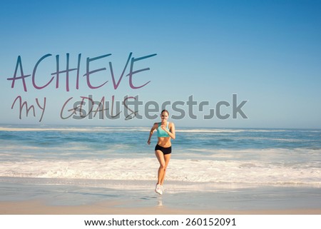 Fit woman jogging on the beach against achieve my goals