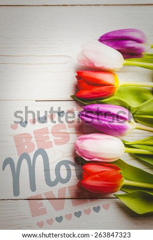best mom ever against tulips on table