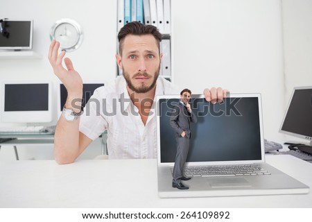 Thinking businessman against confused computer engineer looking at camera with laptop