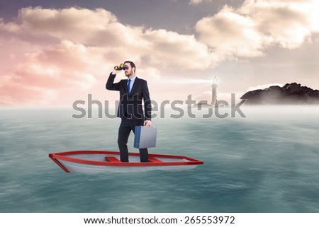 Businessman in boat with binoculars against calm sea with lighthouse