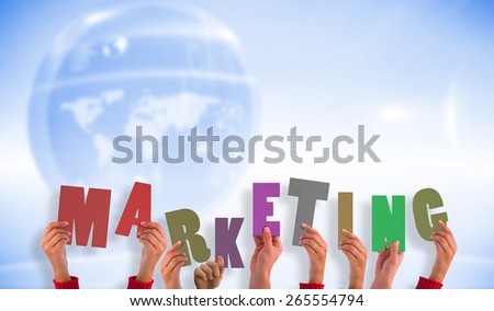 Hands holding up marketing against futuristic technology interface