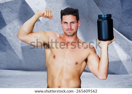Bodybuilder with protein powder against grey angular background