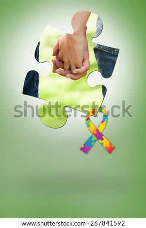 Two friends holding hands against green vignette